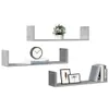 Three U-shaped shelves are displayed against a white background, each with different decorative items. Náhľad obrázku produktu