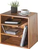 A wooden side table with a plant, a cup of coffee, and some media items. Náhled obrázku produktu