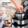 A hand is shown placing a reusable coffee filter into a coffee maker. The background shows a blurred image of two people holding coffee cups. Voir les images du produit