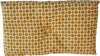 A close-up, front-facing view of a yellow cushion with a geometric pattern and a button in the center. Náhled obrázku produktu