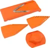 A set of orange mandoline slicer attachments and the main slicer body are arranged on a white background. Anteprima dell’immagine prodotto