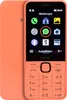 A front view of an orange Nokia 215 4G feature phone, displaying its screen with icons and keypad. Náhled obrázku produktu