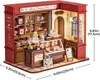 A miniature dollhouse bakery with detailed interior and exterior. Podgląd zdjęcia produktu