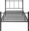 A black metal bed frame is shown from the front against a white background. Voir les images du produit