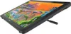 A digital drawing tablet with a stand is shown at an angle. Produktbild-Vorschau