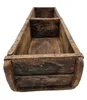 An empty, rustic wooden box with metal reinforcements, shown from a diagonal top-down perspective against a white background. Podgląd zdjęcia produktu