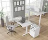 A modern office space with two height-adjustable desks, a chair, and a printer. Podgląd zdjęcia produktu