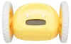 A yellow digital alarm clock with wheels is shown against a white background. Podgląd zdjęcia produktu
