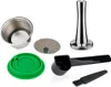 A collection of coffee accessories, including a reusable coffee capsule, a tamper, a scoop, a cleaning brush, and a lid. Produktbild-Vorschau