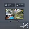 A surveillance system's NVR and multiple camera feeds displayed on a TV screen, set against a dark gray wall and cabinet. Produktbild-Vorschau