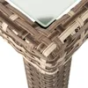 Close-up of the corner of a wicker table with a glass top. Produktbild-Vorschau