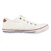 A side view of a white canvas sneaker with brown accents. Produktbild-Vorschau