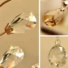 Close-up shots of crystal pendants and a crystal ball, likely from a chandelier or decorative lighting fixture. Produktbild-Vorschau
