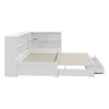 A white daybed with integrated shelving and drawers, shown from a side angle against a white background. Produktbild-Vorschau