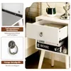 Collage of images showing a white nightstand with an open drawer, a close-up of a drawer handle, and a close-up of drawer slides. Náhled obrázku produktu