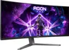 A curved gaming monitor displaying a vibrant, futuristic image with a character and cosmic elements. Náhled obrázku produktu