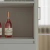 Two bottles of rose wine on a shelf. Produktbild-Vorschau