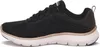 Side view of a black Skechers sneaker with a white sole and gold accents. Voir les images du produit