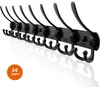 A black coat rack with multiple hooks mounted on a black plaque, shown against a white background. Produktbild-Vorschau
