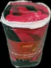 A rolled-up blanket in its clear plastic packaging, with a label on the front. Produktbild-Vorschau