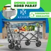 A KESSER® folding wagon filled with groceries is parked in front of a store entrance. Produktbild-Vorschau