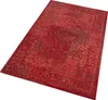 A red rug with a distressed pattern is shown from a high angle. Produktbild-Vorschau