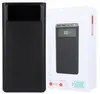 A black power bank is shown next to its white packaging. Produktbild-Vorschau