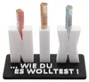 A 3D printed object holding rolled-up banknotes, with text on the base. Produktbild-Vorschau