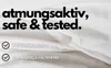A close-up of white fabric with text overlay describing product features. Produktbild-Vorschau