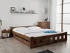 A wooden bed with white bedding is shown in a bedroom setting. Náhled obrázku produktu