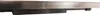 A close-up view of the edge of a stainless steel object, possibly a sink or countertop, with a dark underside and a small black foot visible. Podgląd zdjęcia produktu