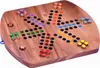 A wooden Ludo board game with colorful playing pieces and dice. Produktbild-Vorschau