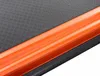 A close-up view of a textured black surface with an orange edge. Náhled obrázku produktu