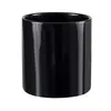 A black ceramic pot on a white background. Produktbild-Vorschau