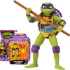 A Teenage Mutant Ninja Turtle action figure, Donatello, is displayed next to its packaging. Voir les images du produit