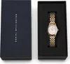 A gold-colored Daniel Wellington watch is displayed in its dark blue packaging box. Produktbild-Vorschau