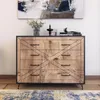A dresser with a decorative pattern on the drawers, placed in a room with a painting above it and a rug in front. Náhled obrázku produktu