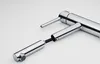 A close-up studio shot of a chrome kitchen faucet with a pull-out spray head. Produktbild-Vorschau