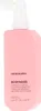 A pink bottle of Kevin Murphy Body Mass Leave-In Plumping conditioning treatment with a white pump dispenser. Náhled obrázku produktu