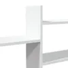 A close-up view of a white shelf unit against a white background. Náhled obrázku produktu