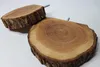 Two wooden slices with visible tree rings and bark, mounted on screws, against a white background. Produktbild-Vorschau