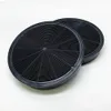 Two black circular carbon filters for a range hood, placed on a white background. Anteprima dell’immagine prodotto