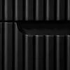 A close-up abstract view of a black ribbed surface with a curved indentation. Produktbild-Vorschau