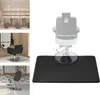 A black salon floor mat with a barber chair base superimposed on it. Náhled obrázku produktu