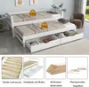 A white daybed with two pull-out drawers, shown with close-up images of its features and materials. Produktbild-Vorschau