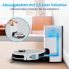A robot vacuum cleaner and its charging/emptying station are shown on a wooden floor, with a diagram illustrating the dust emptying process. Produktbild-Vorschau