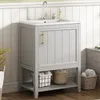 A bathroom vanity with a sink and faucet, set against a white paneled wall. Náhled obrázku produktu
