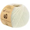 A ball of cream-colored yarn with a brown paper label wrapped around it. Produktbild-Vorschau