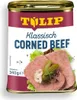 A can of Tulip Corned Beef with a serving suggestion of corned beef slices, pickles, and lettuce. Produktbild-Vorschau