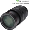 A close-up, angled shot of a camera lens. Produktbild-Vorschau